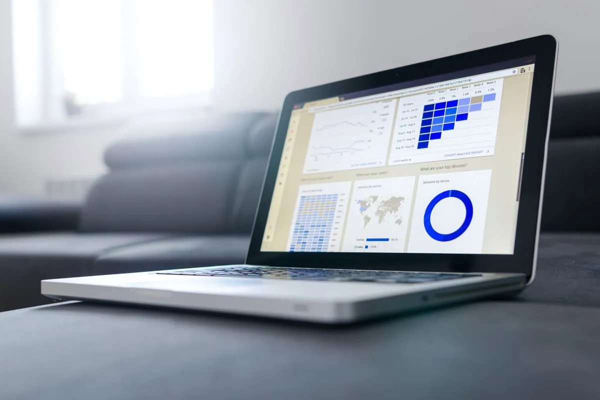 A laptop screen showing website analytics and charts