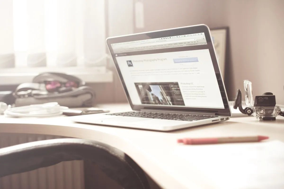 An open laptop on a clean, modern desk