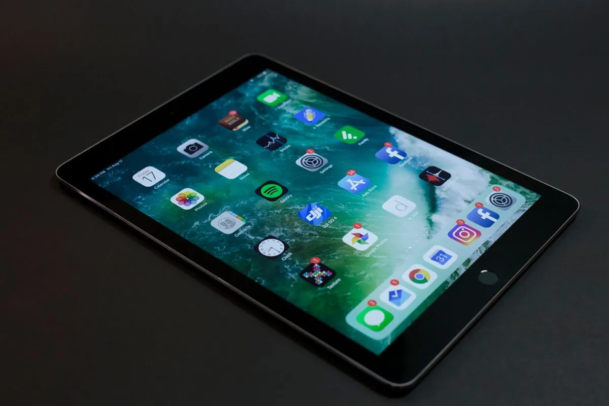 A tablet and devices displaying apps and a website
